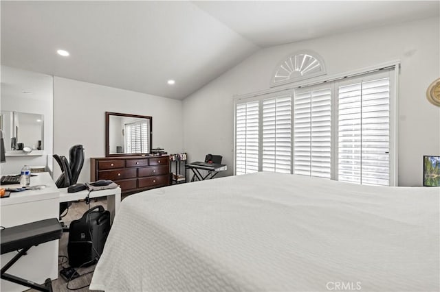 bedroom with vaulted ceiling and recessed lighting