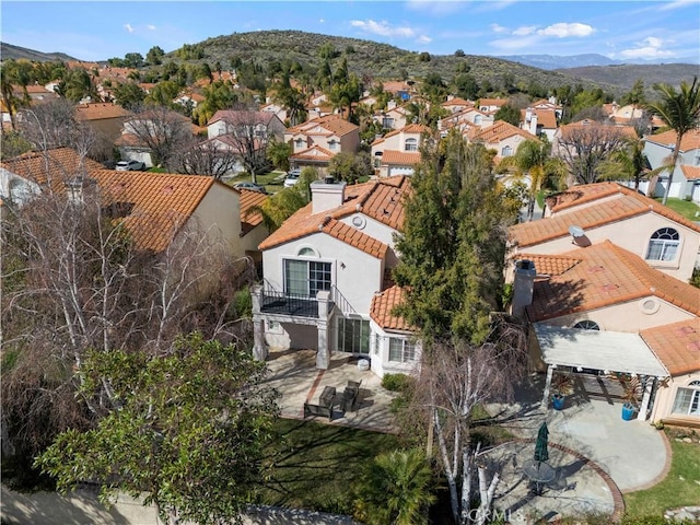 bird's eye view with a residential view and a mountain view