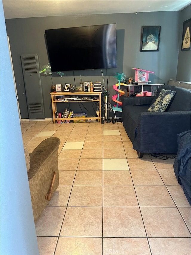 living area featuring tile patterned floors