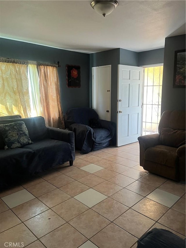 living room with light tile patterned flooring