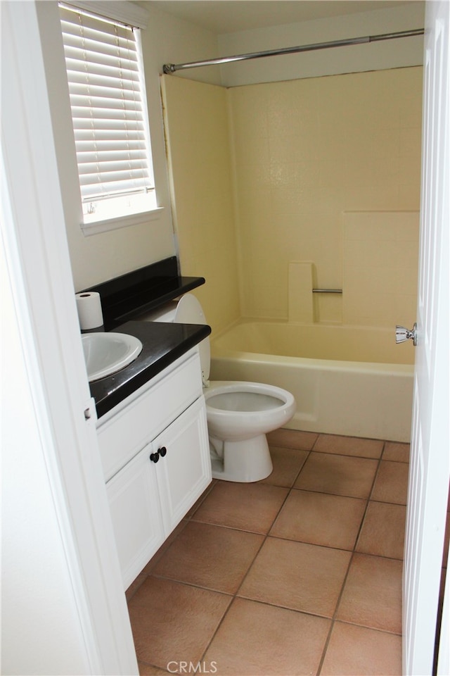 full bathroom with vanity, bathtub / shower combination, tile patterned flooring, and toilet