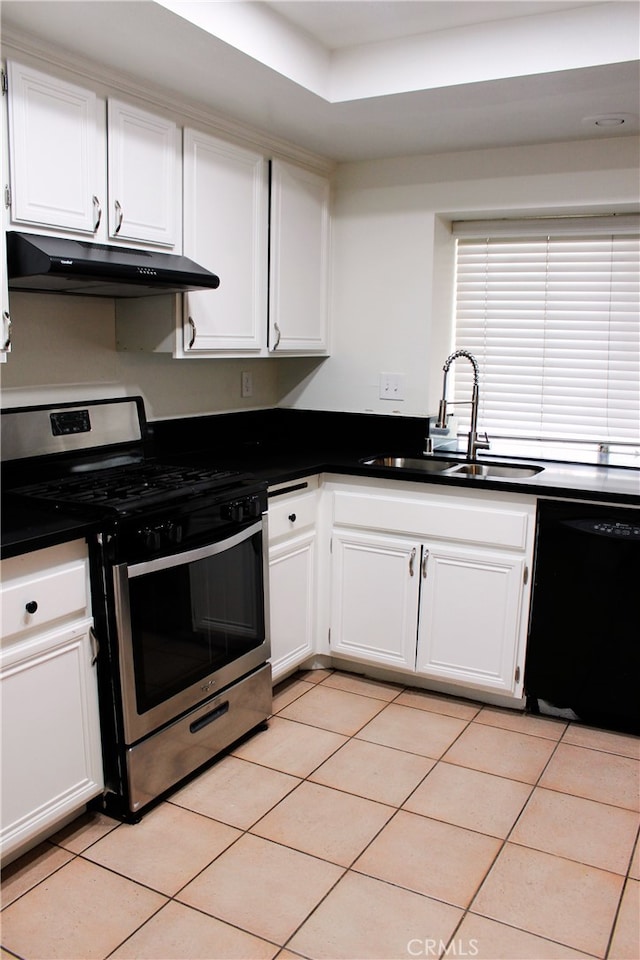 kitchen featuring dishwasher, stainless steel gas range, under cabinet range hood, white cabinetry, and a sink