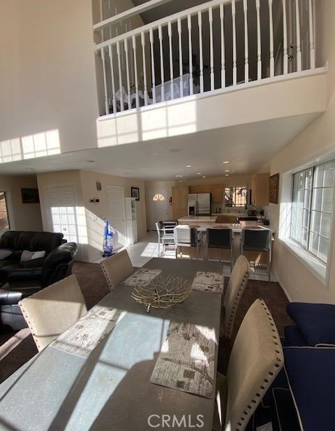 living room with a high ceiling