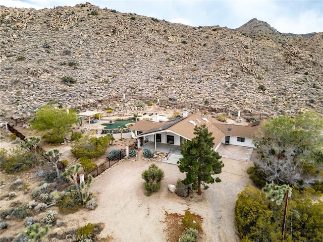 bird's eye view with a mountain view