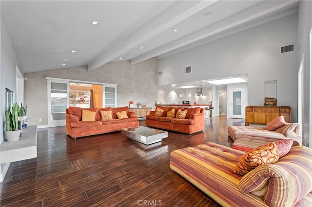 living area featuring visible vents, wood finished floors, beamed ceiling, high vaulted ceiling, and recessed lighting