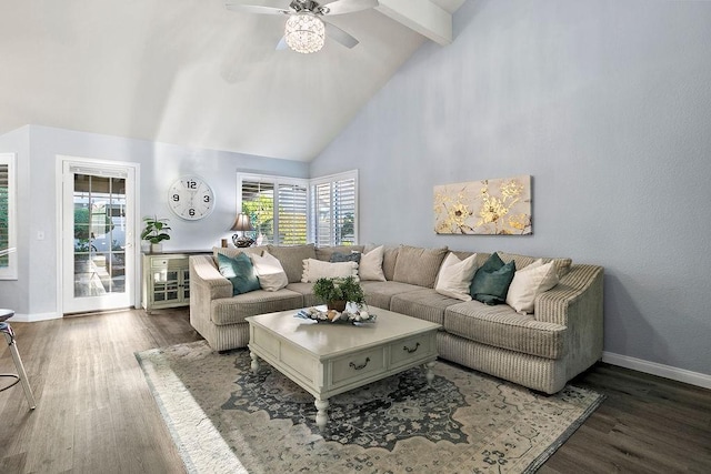 living room with high vaulted ceiling, wood finished floors, ceiling fan, and plenty of natural light