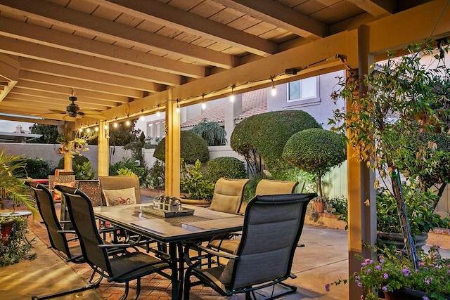 view of patio featuring outdoor dining area and fence private yard