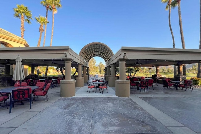 view of patio / terrace with a gazebo and outdoor dining space