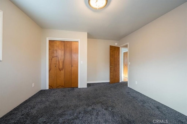 unfurnished bedroom featuring carpet