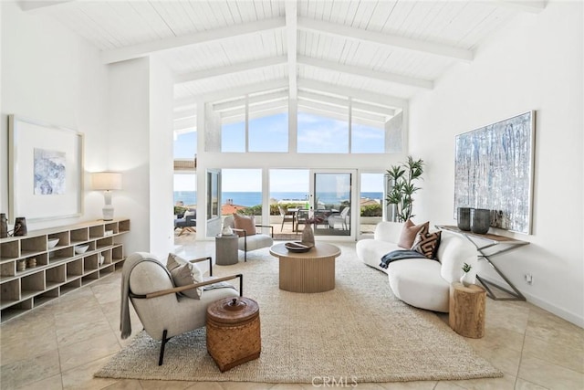 interior space featuring a water view, high vaulted ceiling, wooden ceiling, beamed ceiling, and baseboards