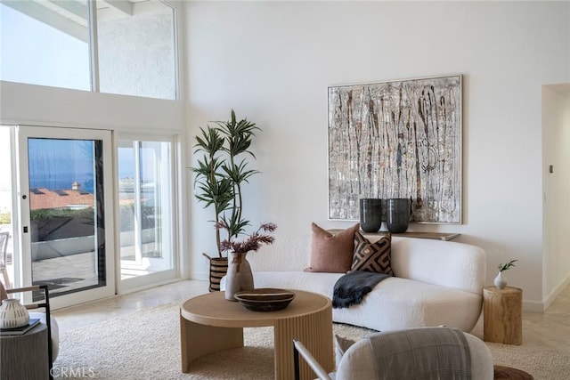 sitting room featuring baseboards