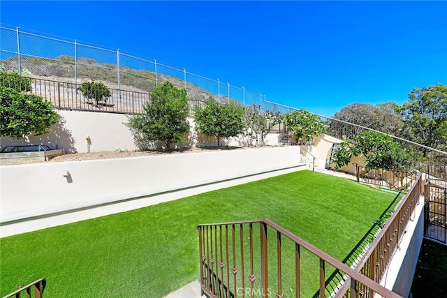 view of yard featuring a fenced backyard