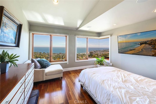 bedroom with recessed lighting, dark wood finished floors, and baseboards