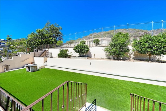 view of yard featuring fence