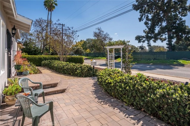 view of patio with fence