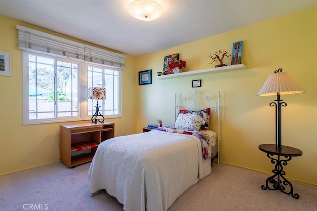 bedroom featuring carpet