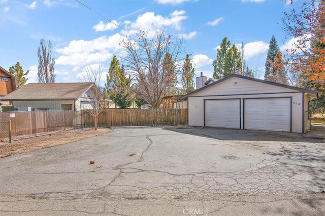 garage featuring fence