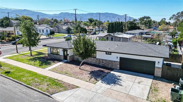 bird's eye view with a residential view and a mountain view