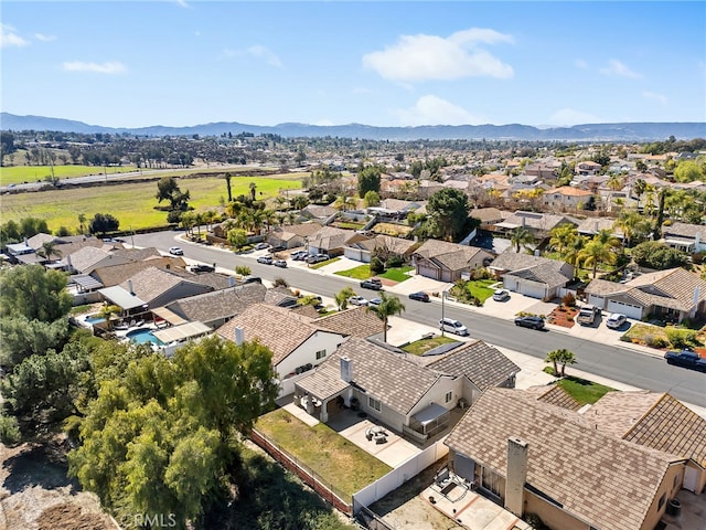 birds eye view of property featuring a residential view and a mountain view