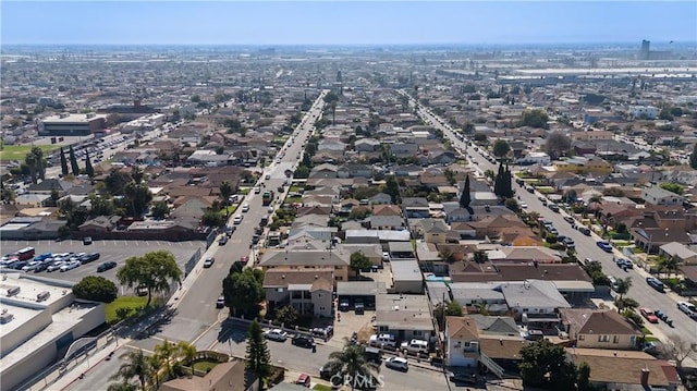 birds eye view of property with a view of city