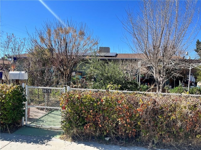 exterior space featuring a gate and fence