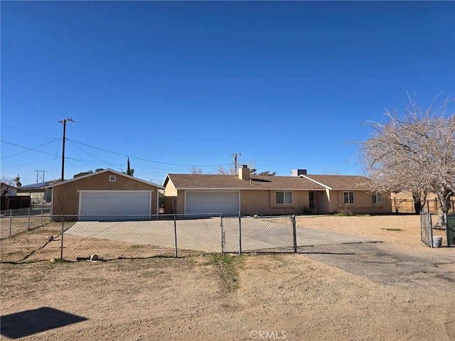 ranch-style house with fence and stucco siding