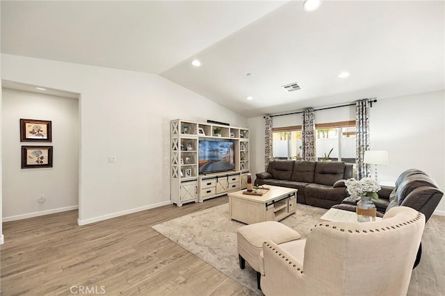 living area featuring recessed lighting, visible vents, light wood-style flooring, vaulted ceiling, and baseboards