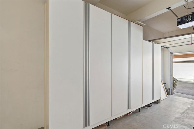 1703 Solvay Aisle Unit 106, Irvine, CA 92606 - garage featuring a garage door opener