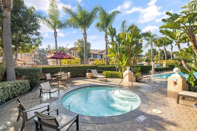 1703 Solvay Aisle Unit 106, Irvine, CA 92606 - community pool with a patio area