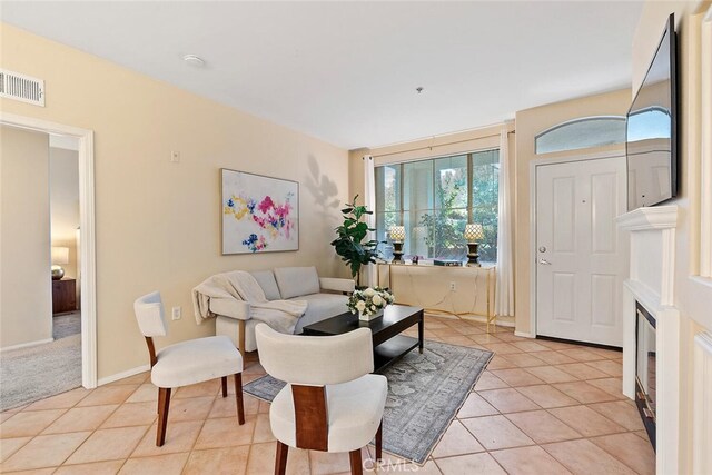 1703 Solvay Aisle Unit 106, Irvine, CA 92606 - living room with light tile patterned floors