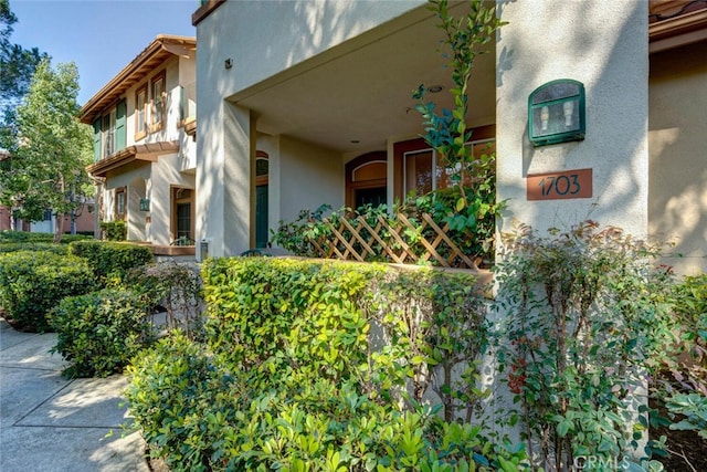 exterior space with stucco siding