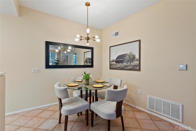 1703 Solvay Aisle Unit 106, Irvine, CA 92606 - dining space featuring a chandelier and light tile patterned flooring