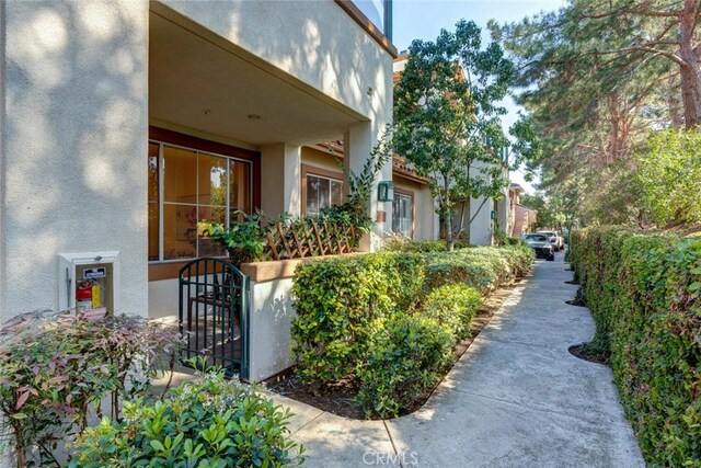 1703 Solvay Aisle Unit 106, Irvine, CA 92606 - view of side of home with stucco siding