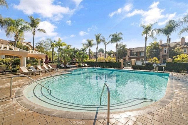 1703 Solvay Aisle Unit 106, Irvine, CA 92606 - community pool featuring a residential view and a patio area