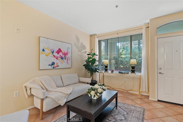1703 Solvay Aisle Unit 106, Irvine, CA 92606 - living room featuring light tile patterned floors