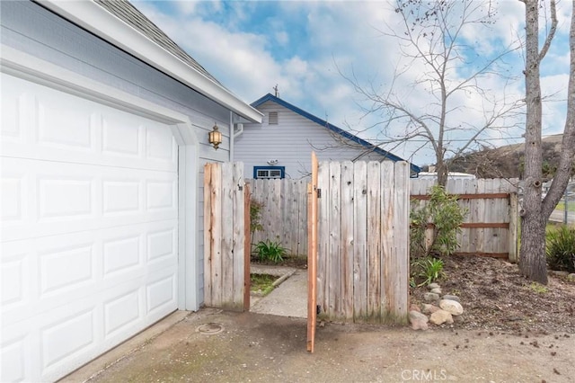 garage with fence