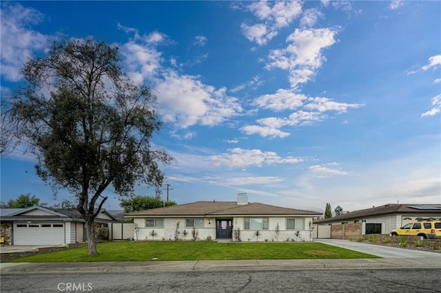 single story home with driveway, a chimney, an attached garage, fence, and a front lawn