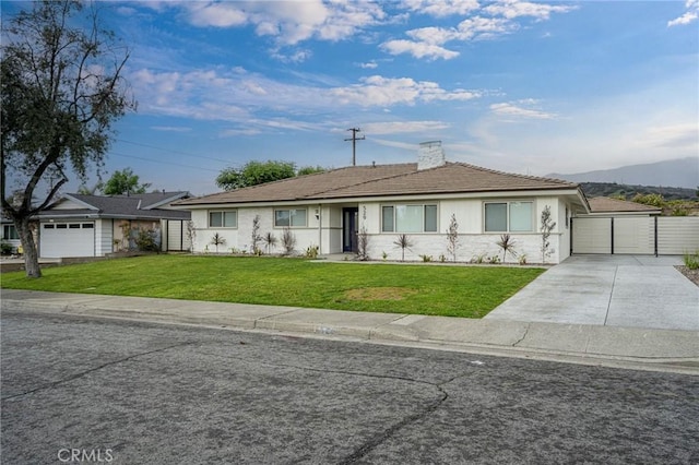 single story home with driveway, a front lawn, a chimney, and a gate