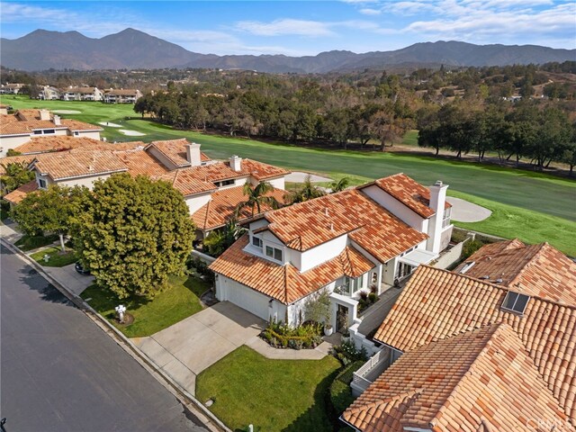 bird's eye view featuring a residential view and a mountain view