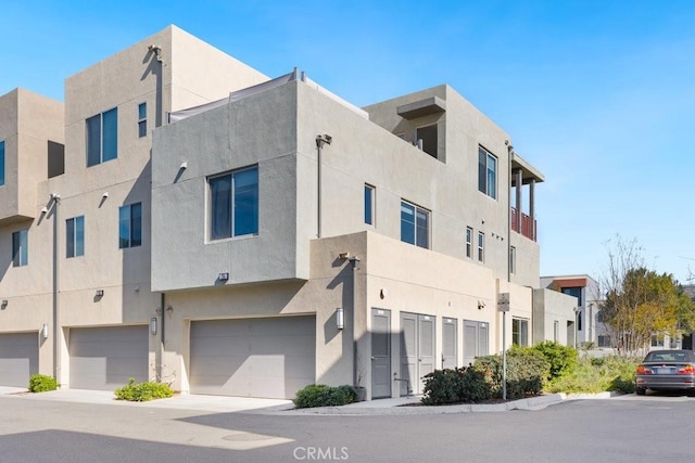 view of building exterior featuring an attached garage