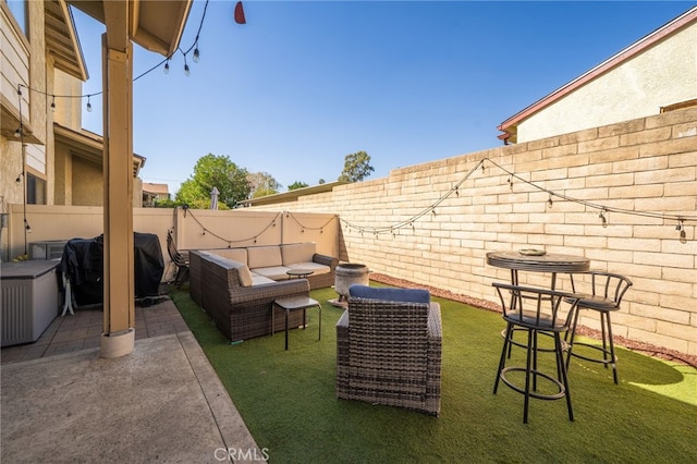 view of patio / terrace with a fenced backyard and an outdoor hangout area