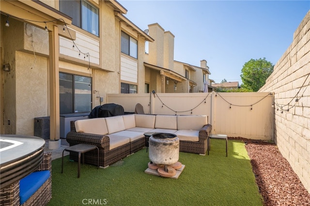 view of patio / terrace with a fenced backyard and an outdoor hangout area