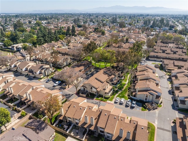 birds eye view of property featuring a residential view and a mountain view