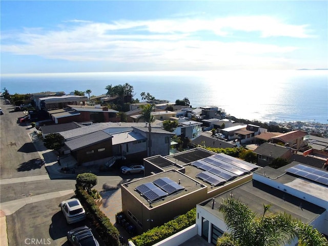 birds eye view of property featuring a residential view and a water view