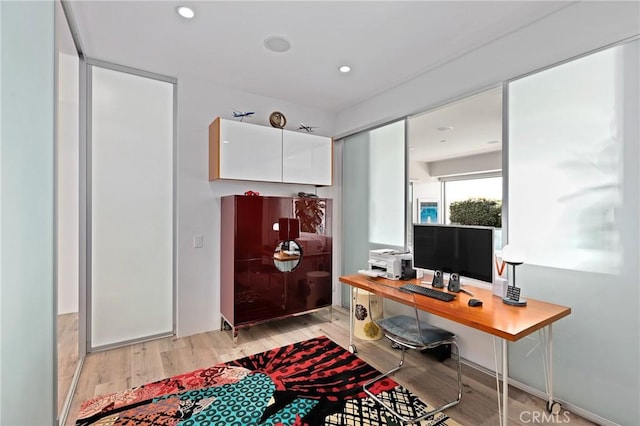 office featuring recessed lighting and light wood-style flooring