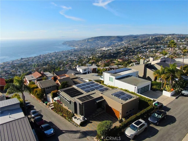 birds eye view of property featuring a residential view and a water view