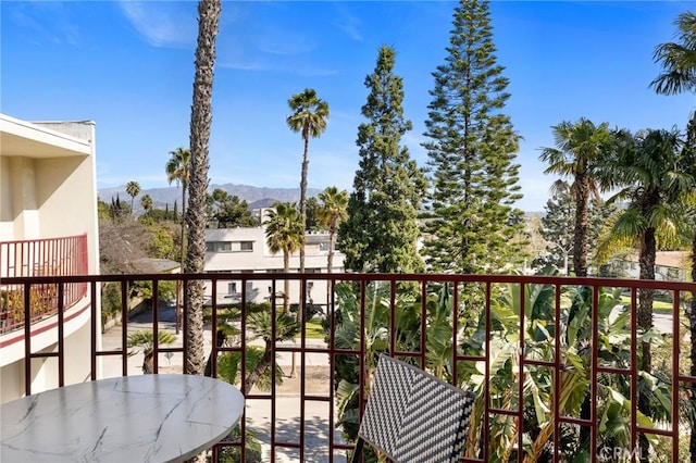 balcony featuring a mountain view