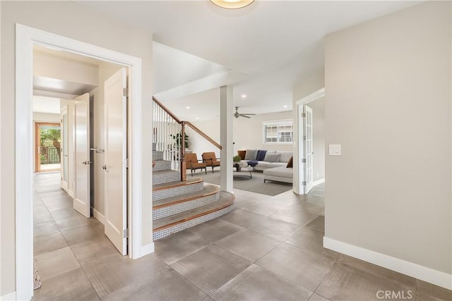 foyer entrance with recessed lighting, stairs, baseboards, and ceiling fan