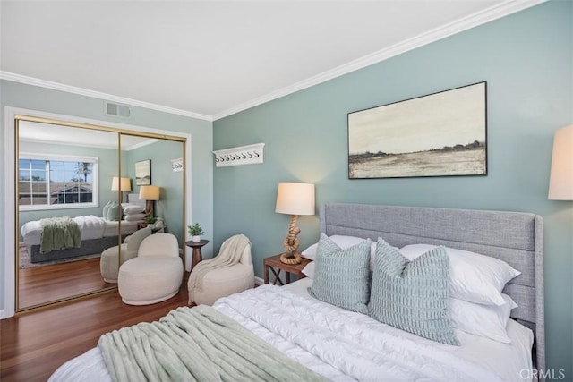 26925 Calle Dolores, Dana Point, CA 92624 - bedroom featuring ornamental molding, wood finished floors, and a closet