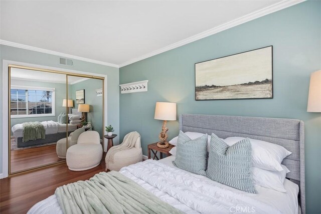 26925 Calle Dolores, Dana Point, CA 92624 - bedroom with ornamental molding, wood finished floors, and a closet